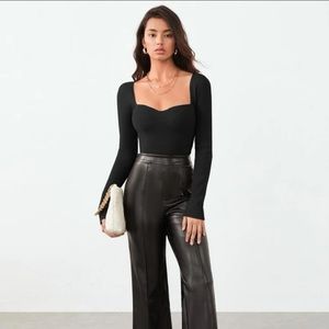 Black slit hemmed rib knit sweater